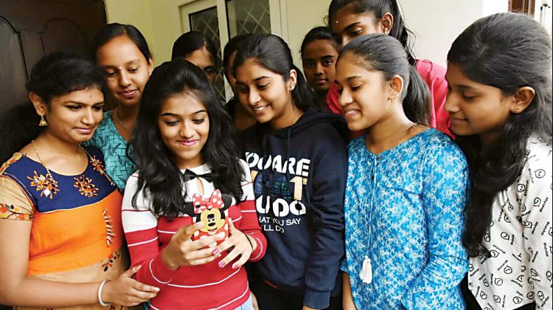Bengaluru: Two girls share top SSLC honours, score perfect 10