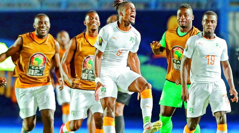 Wilfried Zaha fires Ivory Coast into quarters