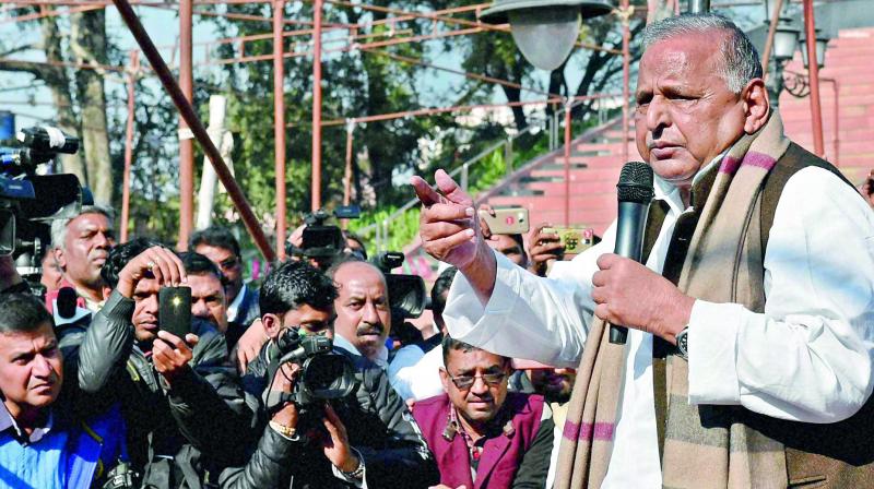 Samajwadi Party supremo Mulayam Singh Yadav addresses his followers at the party office in Lucknow on Wednesday.  (Photo: PTI)