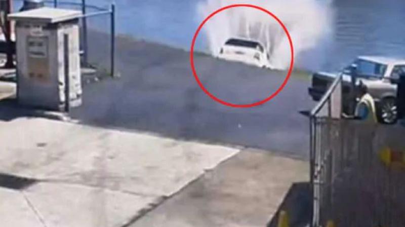 Watch: US woman hits accelerator instead of brakes, plunges into river