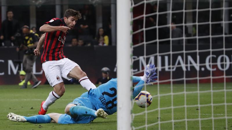 Serie A: AC Milan revives Champions League hopes with a 2-1 win over Bologna