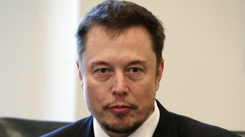 Tesla CEO Elon Musk listens as President-elect Donald Trump speaks during a meeting with technology industry leaders at Trump Tower in New York. (Photo: AP)