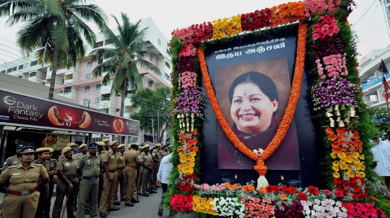 Security men guard during an AIADMK rally to pay tribute J Jayalalithaa in Coimbatore. (Photo: PTI)