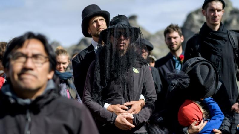Climate funeral march in Swiss mountains