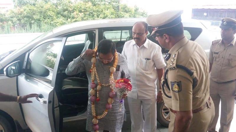 Deputy Chief Minister Dr G. Parameshwar, accompanied by District Congress Committee president Harish Kumar, arrives at Dharmasthala to pacify Siddaramaiah.