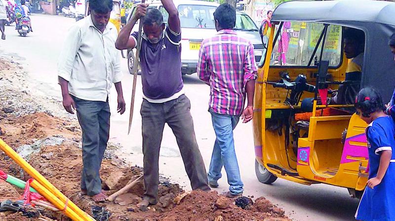 This road in Marredpally is dug up and poses a health and safety hazard to residents and commuters. (Photo: DC)
