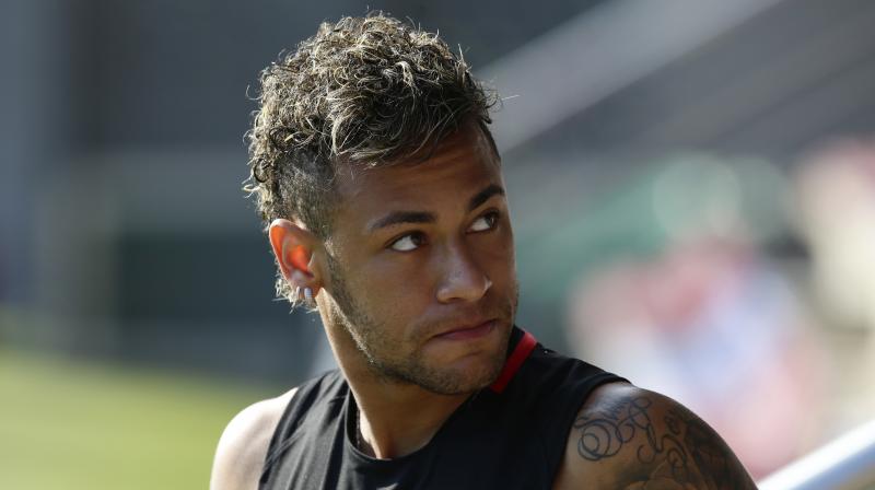 Neymars decision to visit Shanghai comes a day after a major event organiser in China said a meet-and-greet with the forward on Monday in Shanghai was off because he and his advisers were busy with transfer business. (Photo: AP)