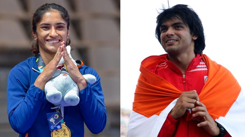 Vinesh soon rubbished the report saying it was just a sign of encouragement by the Indian flag bearer and she was disappointed that it was portrayed in the wrong way. (Photo: PTI/AP)