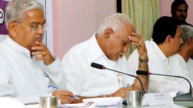 Angry flood victims vent anger on CM B S Yediyurappa, gherao him