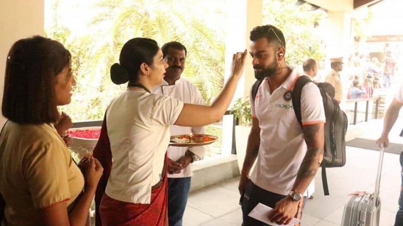 The players got a traditional welcome at the hotel with thalapoli, panchavadyam, chendamelam and kathakali. (Photo: Twitter | @kadakampalli)