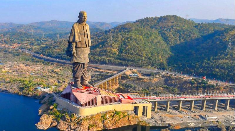 Sardar Patels Statue of Unity in Gujarats Narmada district is twice as tall as the Statue of Liberty in the US. Iron was collected from all over the country to build the statue. (Photo: @PMOIndia twitter via PTI)