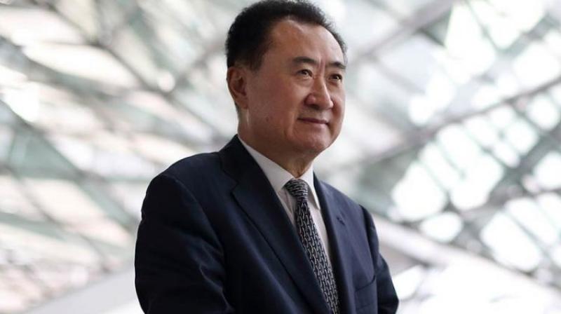 Wang Jianlin, 62, founder and chairman of Dalian Wanda Group Co, whose business includes shopping malls, theme parks, sports clubs and cinemas, said he is most likely to pick from a group of professional managers to take over the running of his business. (Photo: Twitter)