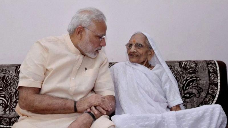 Prime Minister Narendra Modi with his mother. (Photo: PTI)