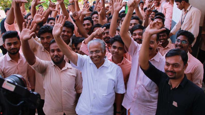 UDF candidate E.T. Muhammed Basheer with students of a private polytechnic college in Kadampuzha.