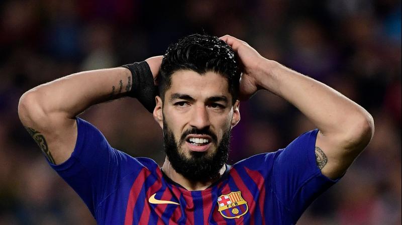 Suarez is unlikely to face Getafe at home in La Liga on Sunday before Barcelona play away to Eibar the following weekend in their last league game of the season. (Photo: AFP)