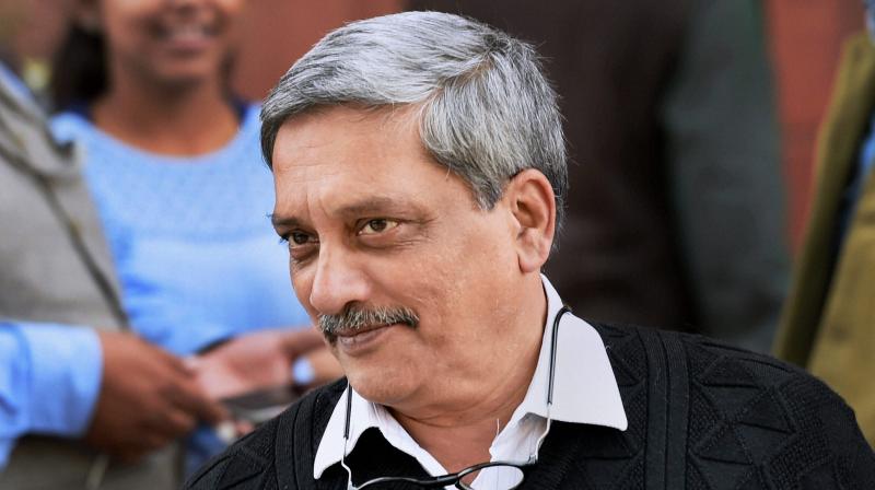 Defence Minister Manohar Parrikar at Parliament House during the winter session, in New Delhi. (Photo: PTI)