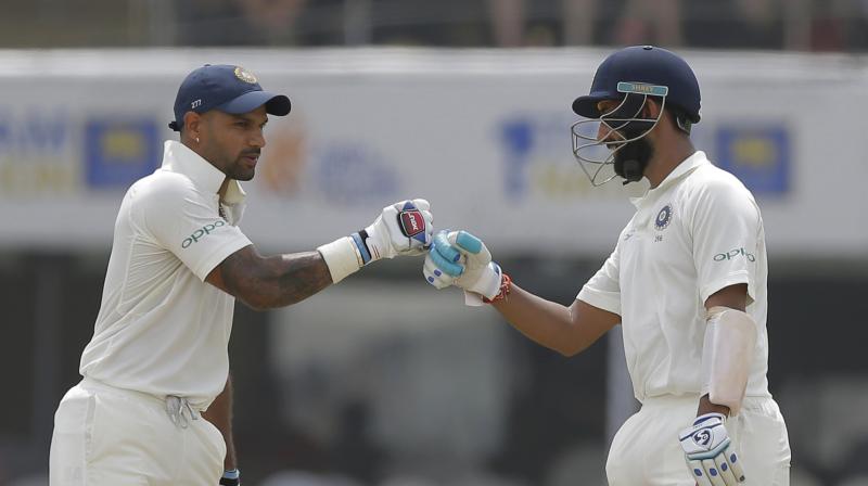 Gavaskar claimed that retaining Shikhar Dhawan for the second Test was justified as the left hander made a major impact, scoring a blistering 190 in the first innings of the Galle Test. (Photo: AP)