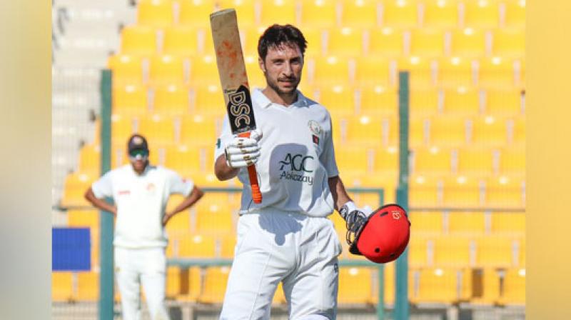 Afghan Shah hits historic century