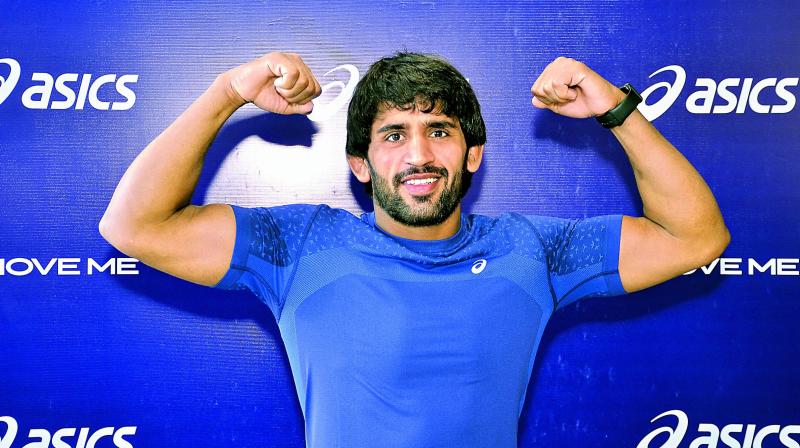 Wrestler Bajrang Punia poses at an event in New Delhi on Tuesday.
