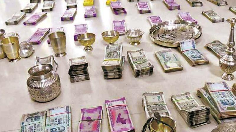 SIT sleuths inspected IMA gold office in Shivajinagar and seized 41.5 kg of gold ornaments, 71.77 kg of bullion gold and Rs 14 lakh in cash. They also seized 14.5 carat diamond, 60 carat semi precious stones 470 gm of silver ornaments during the raid.