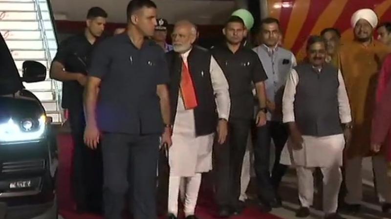 PM Modi returns from US trip, thousands gather to welcome