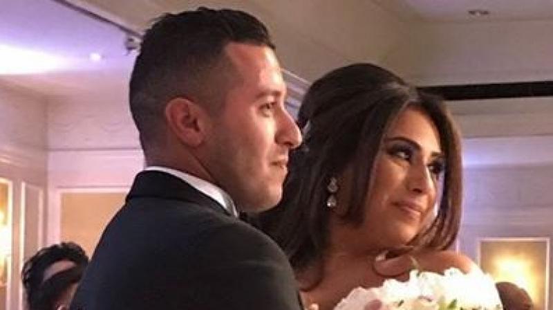 The couple, from Enfield in North London, had two weddings earlier this year a registrar wedding in April for Alis Turkish family (Photo: Facebook)
