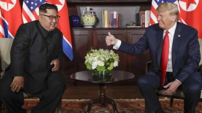 US President Donald Trump said, 'We signed a joint statement that is an unwavering commitment to complete denuclearisation of North Korea.' (Photo: AFP)