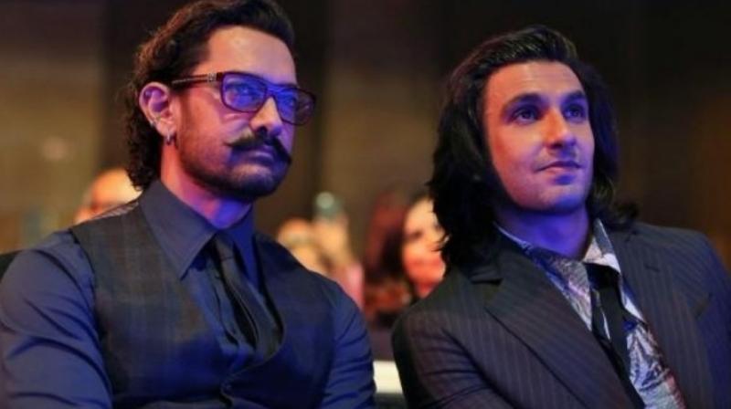 Aamir Khan and Ranveer Singh at an event.