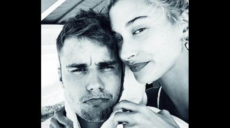 According to www.justjared.com, the 22-year-old model shared a cute selfie of her and her 25-year-old singer husband while on vacation.