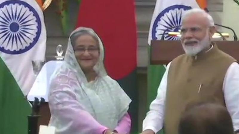 PMâ€‰Modi, Sheikh Hasina jointly inaugurate 3 projects, sign pacts after Delhi meet