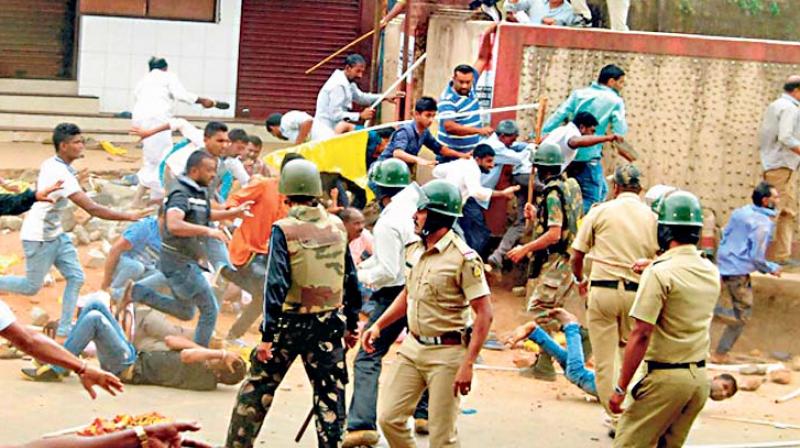 A file photo of police dispersing a mob that indulged in violence during Tipu Jayanti celebrations in Kodagu in 2015.