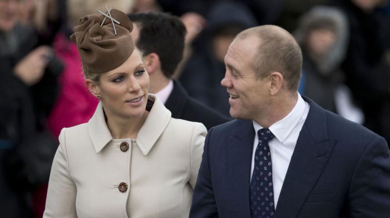 Granddaughter of Britains Queen Elizabeth II, Zara Phillips and her husband Mike Tindall. (Photo: AP)