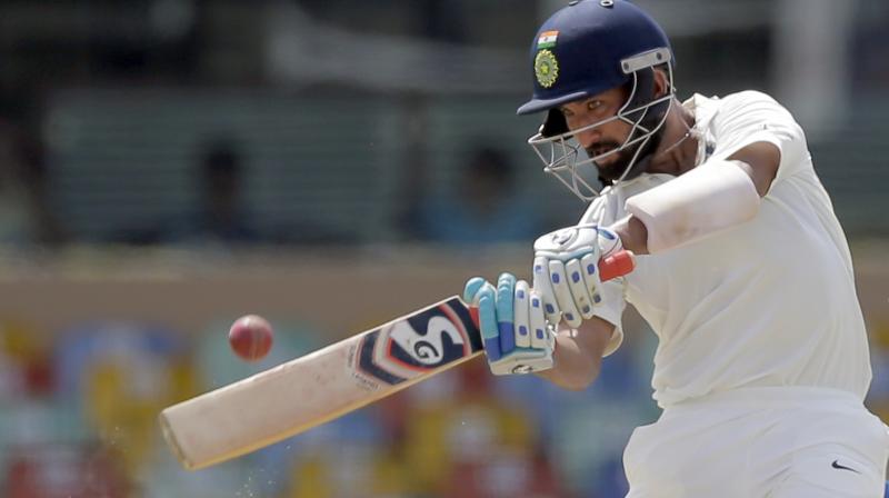 Pujara (133) and Ajinkya Rahane (132) added 217 runs to guide India to 622-9 declared in the first innings. (Photo:AP)