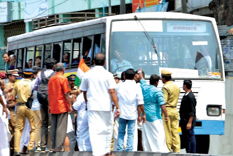 Congress leaders block vehicles as part of the 12-hour-long hartal in Thiruvananthapuram on Thursday. (Photo: A.V. MUZAFAR)