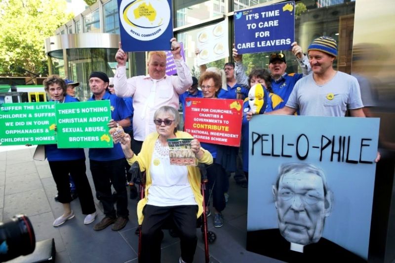 Protesters gathered outside court where Cardinal George Pell was due for a pre-sentencing hearing. (Photo: AFP)