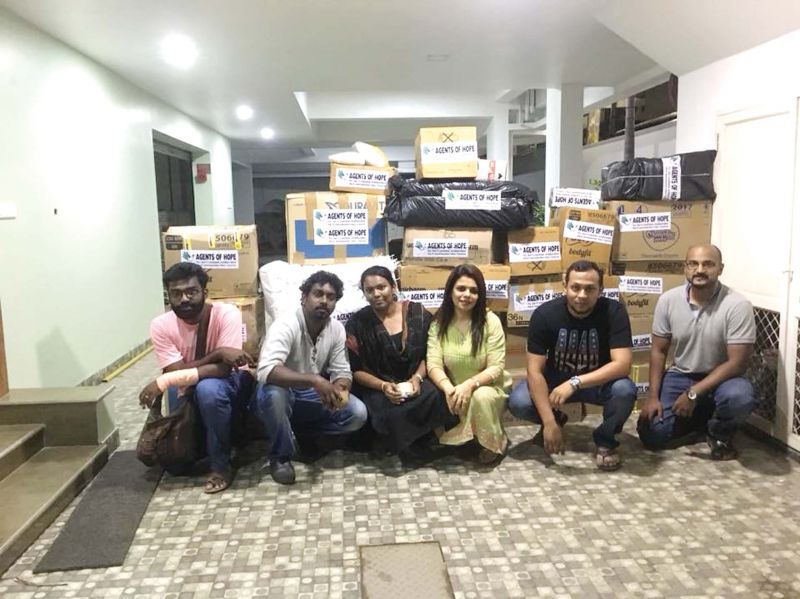 Agents of Hope team with relief materials for the flood affected