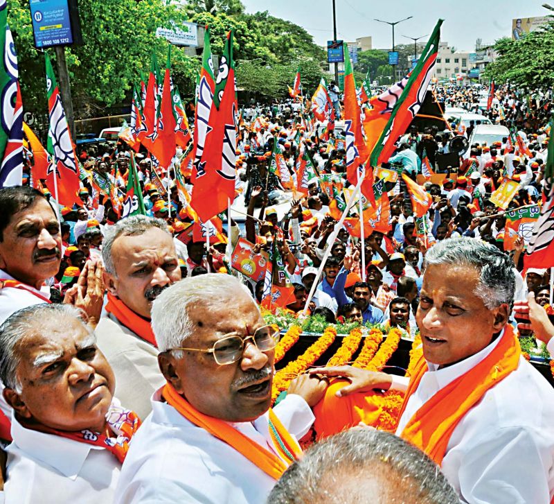 BJP candidate for Chamarajanagar seat V. Srinivasprasad at a rally after filing his nomination papers in Chamarajanagar on Tuesday (Photo: KPN)