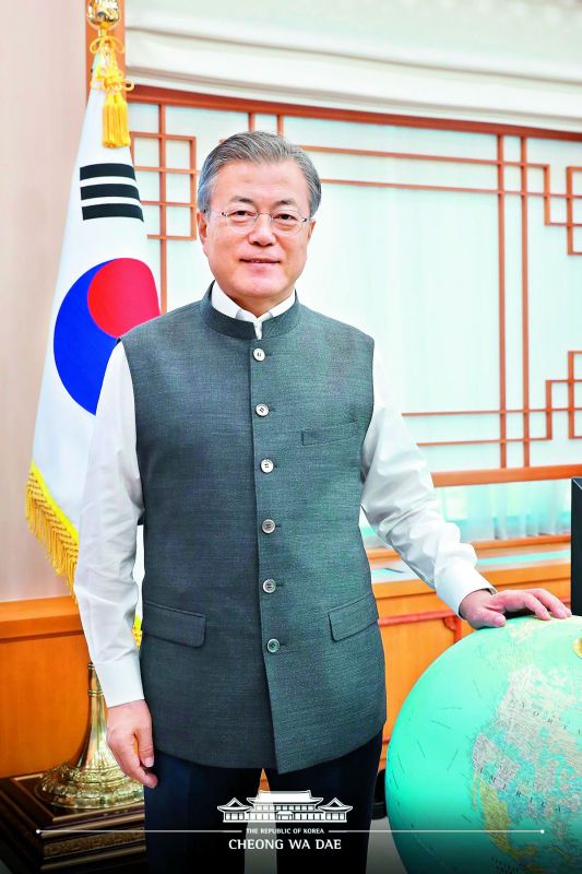 The South Korean President wearing the Modi vest, which he appreciated immensely