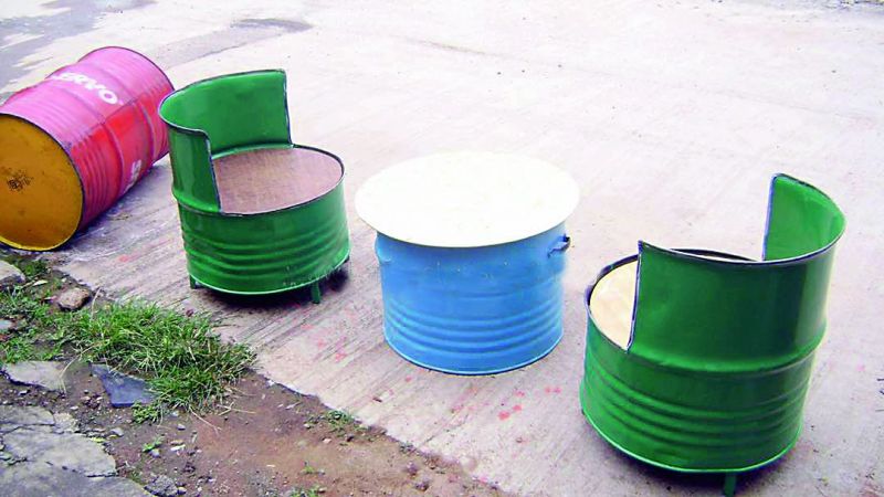 A view of furniture created out of discarded drums. 