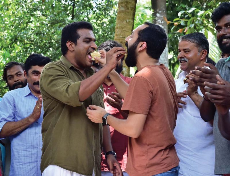 Fahad Fazil (Best Supporting Actor) and Dilesh Pothen (director, Thondimuthalum Driksakshiyum) on the location of a film at Eratuppetta celebrating winning national film awards on Friday.