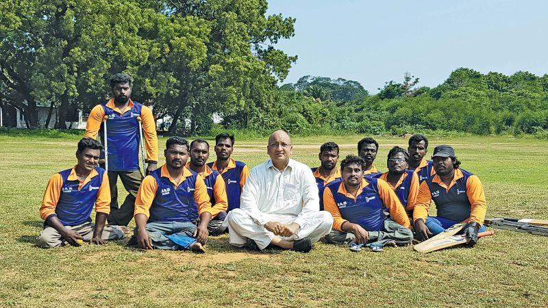 Mohammed Asif Ali with diff-abled players at a cricket match.