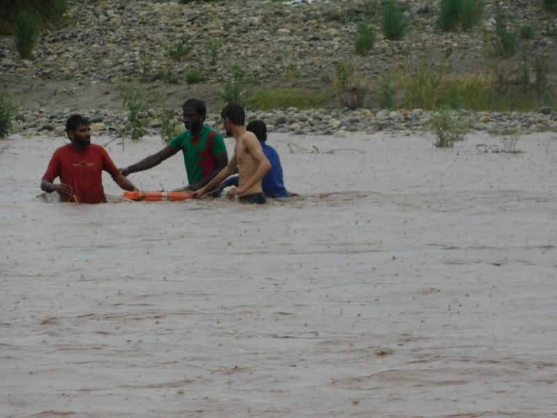 Six men who got trapped in the middle of the Tawi river near Pukroo. (Photo: ANI/Twitter)
