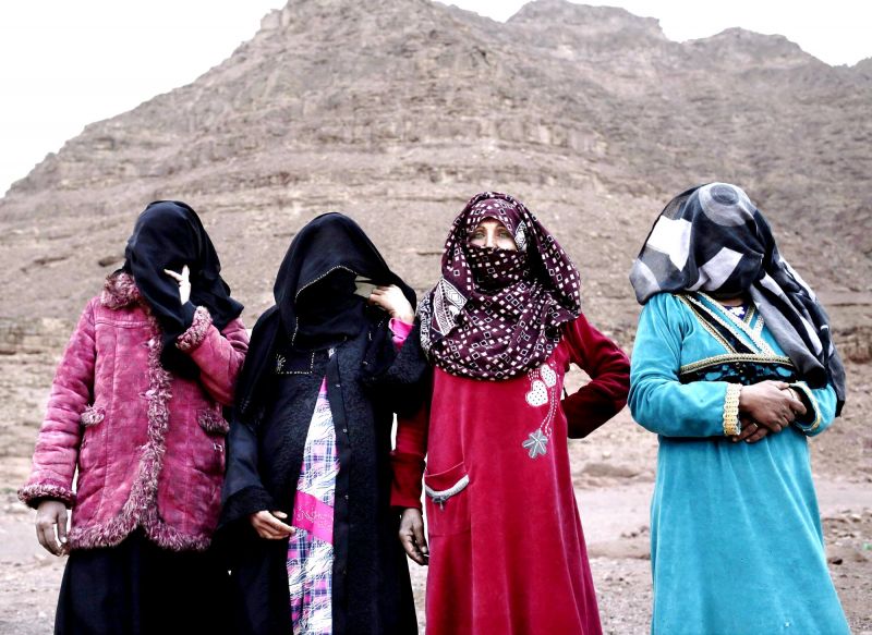 The first female Bedouin guides, from right, Selima, Umm Yasser, Umm Soliman, and Aicha, pose for a photograph in Wadi Sahw, South Sinai, Egypt. (Photo: AP) 