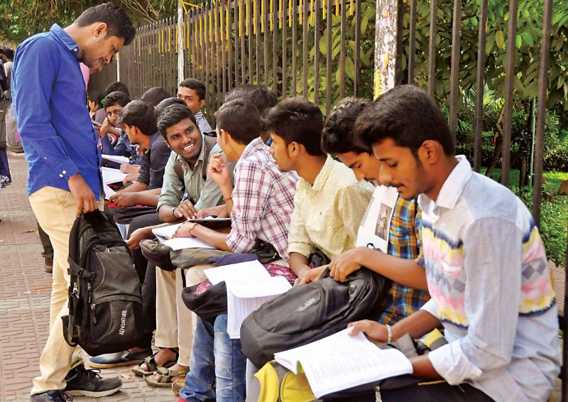 Last minute preparations by students of a PU College in Sheshadripuram. (Photo: DC)