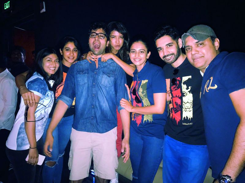 Pranathi, Regina, Adivi, Lakshmi, Rakul, Sushant and Ch Singh catch the first show of the movie dressed in Baahubali tshirts