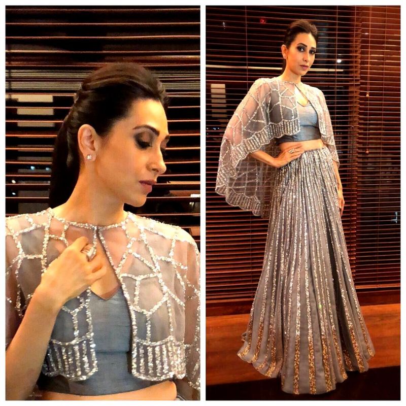 Karisma looking stunning in a grey lehenga cape, embellished with silver shimmer by Neeruâ€™s. (Photo: Instagram/ therealkarismakapoor)