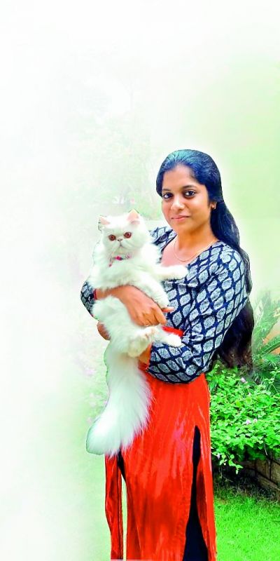  feeling alive:  Mohd. Afra Sherlyn has two pet kittens named Crystal and Caramel, who make her feel alive