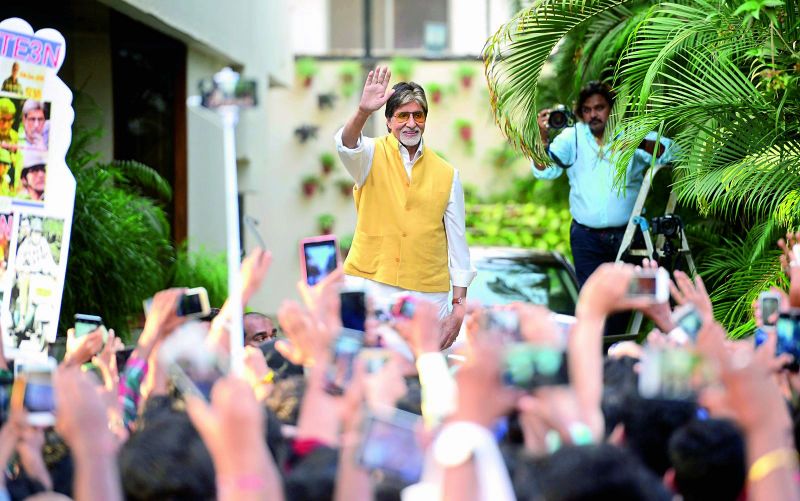 Photographer Paresh Mehta clicking Big B's pictures outside his house.