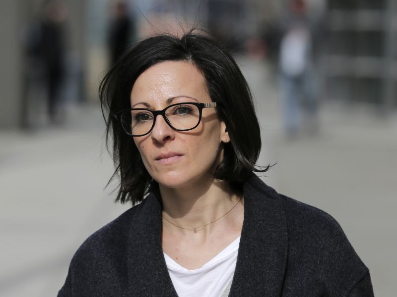 In this Jan. 29, 2019 file photo, Lauren Salzman leaves Brooklyn federal court in New York. Salzman, a former follower of self-help guru Keith Raniere, told a jury on Friday, May 17, 2019 how Raniere created a sorority of sex slaves under his command as the leader of the upstate New York group that called itself NXIVM. Raniere pleaded not guilty to charges he formed the secret society within NXIVM that branded devotees with his initials. (AP Photo/Seth Wenig, File) 
