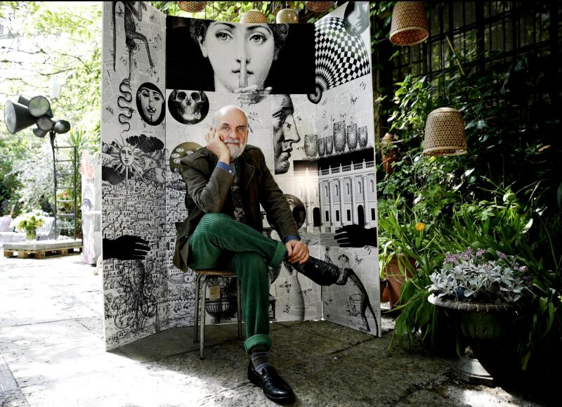 Design artistic director Barnaba Fornasetti poses in front of a paravent folding screen 'Fornasettiana Remix', made with regenerated polystyrene, for the â€˜RO Plastic - Master's Piecesâ€™ exhibition at Milan. (Photo: AP)